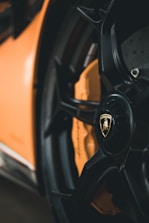 a close up of a wheel on a sports car