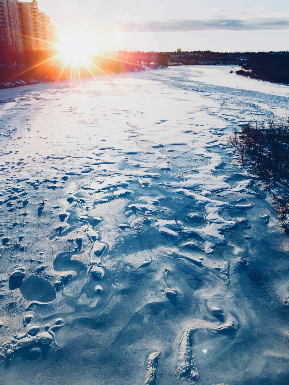 frozen body of water during daytime