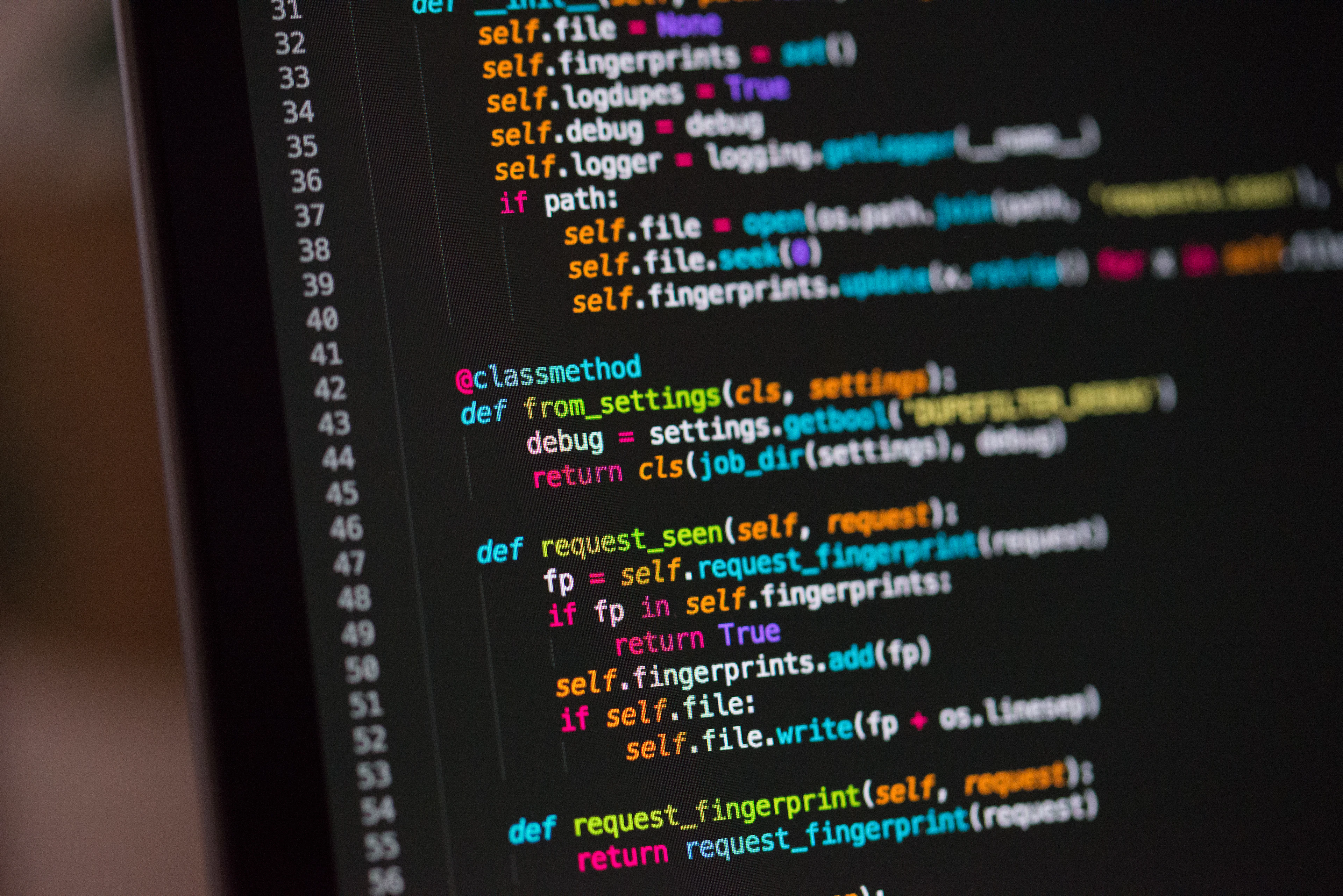 Code on a dark computer screen