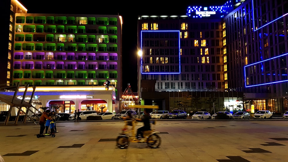 cars parked near building during night