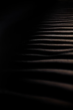 Still from a gripping narrative series with moody lighting.