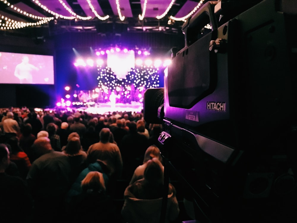 group of people inside stage watching live show