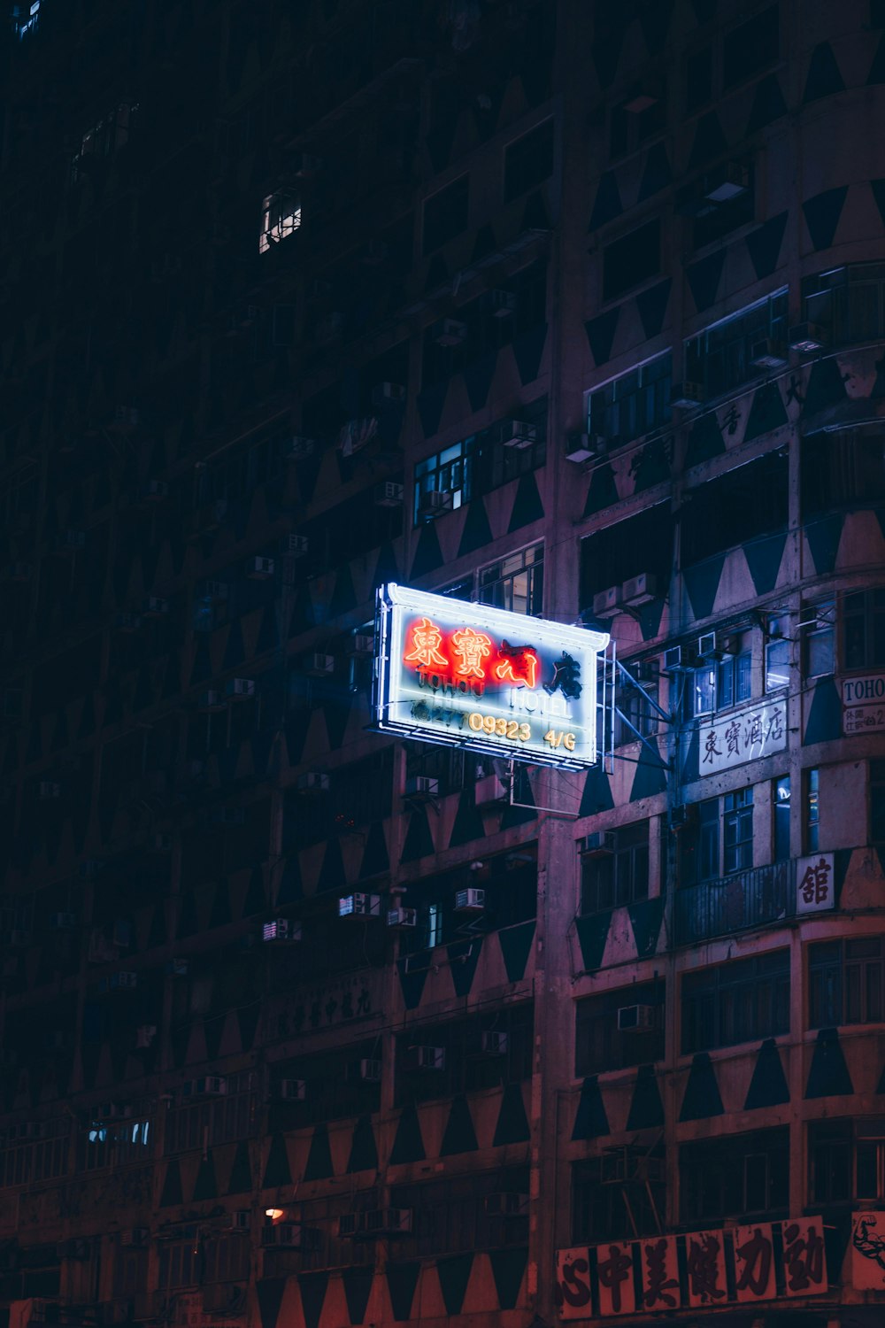 lighted white and red LED signage