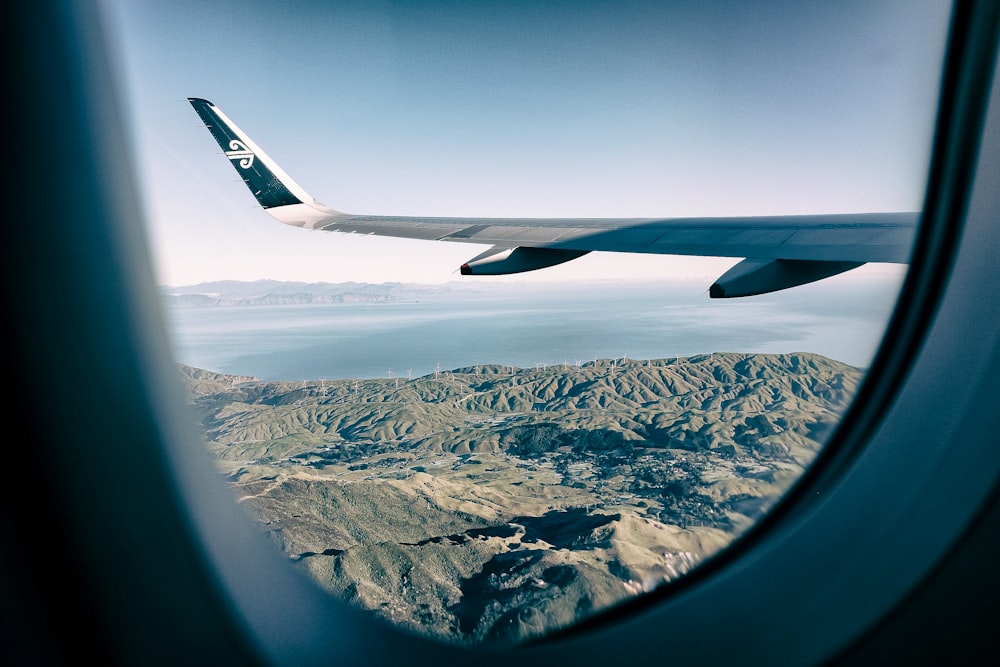 plane wings outside plane window