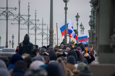 group of people walking straight during daytime saint nicholas google meet background