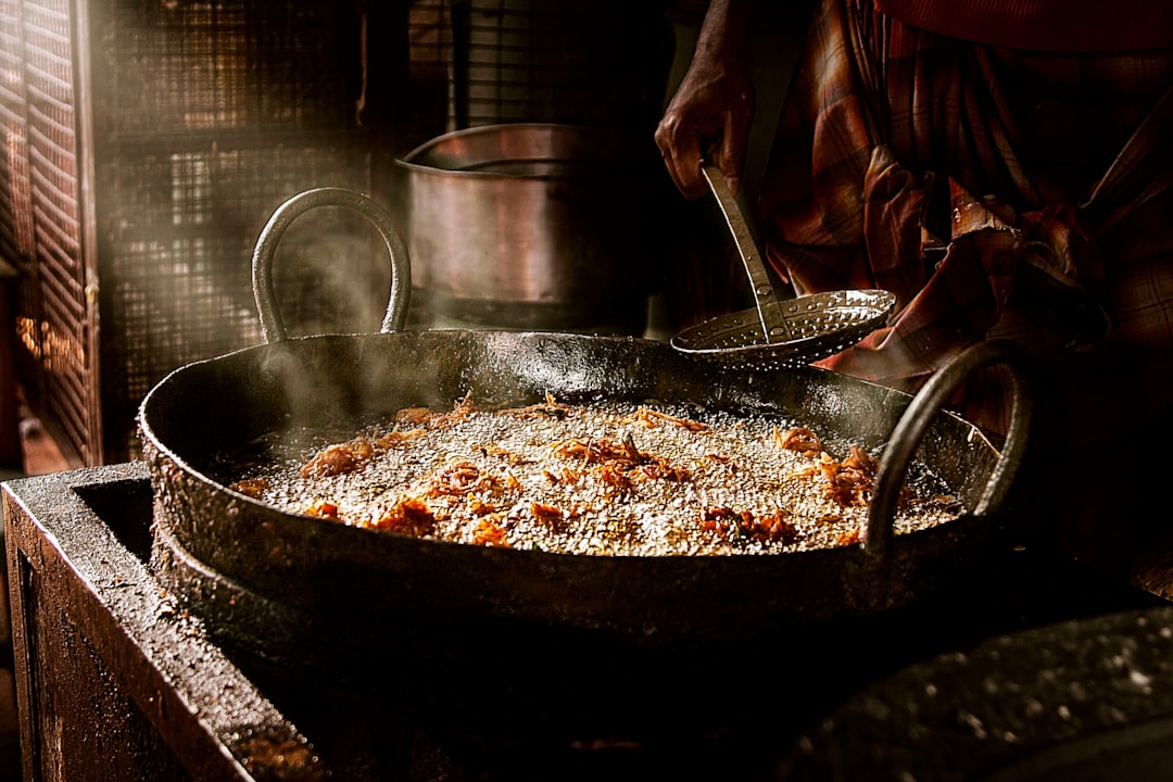 Shooting in the market early in the morning is always such a great way to know a city . This has been taken in Thiruvananthapuram vegetable market. These are onion fritters being fried in the hot oil. All photographs remind you of the moment of capture and this is so evocative of the sights, sounds and smells of the market.