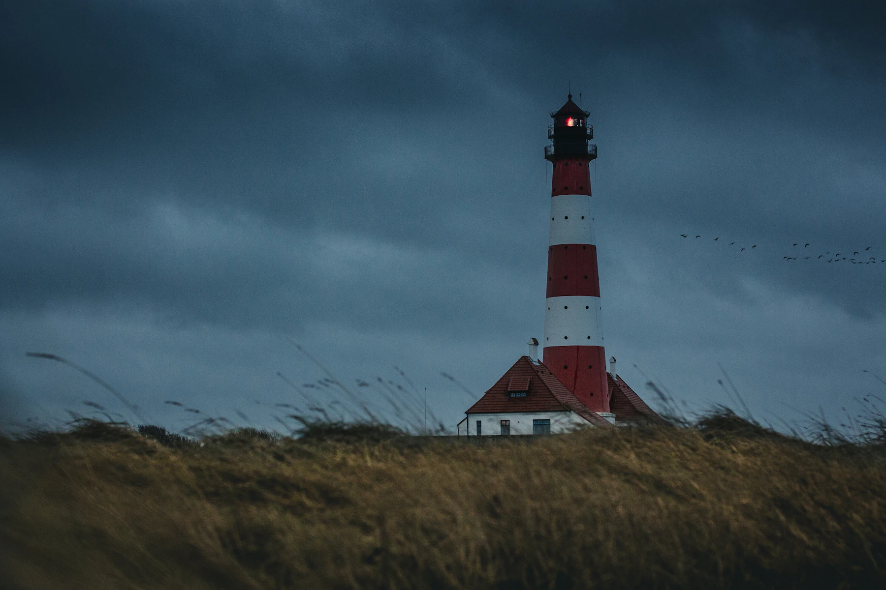 A lighthouse on a rocky coast