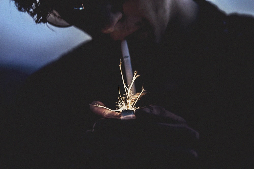 person holding lighter