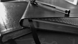 Close-up of premium quality pens and notebooks.