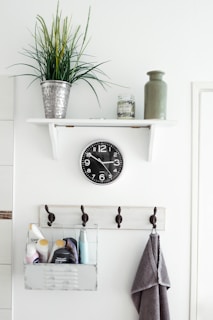 round white analog clock at 3:50