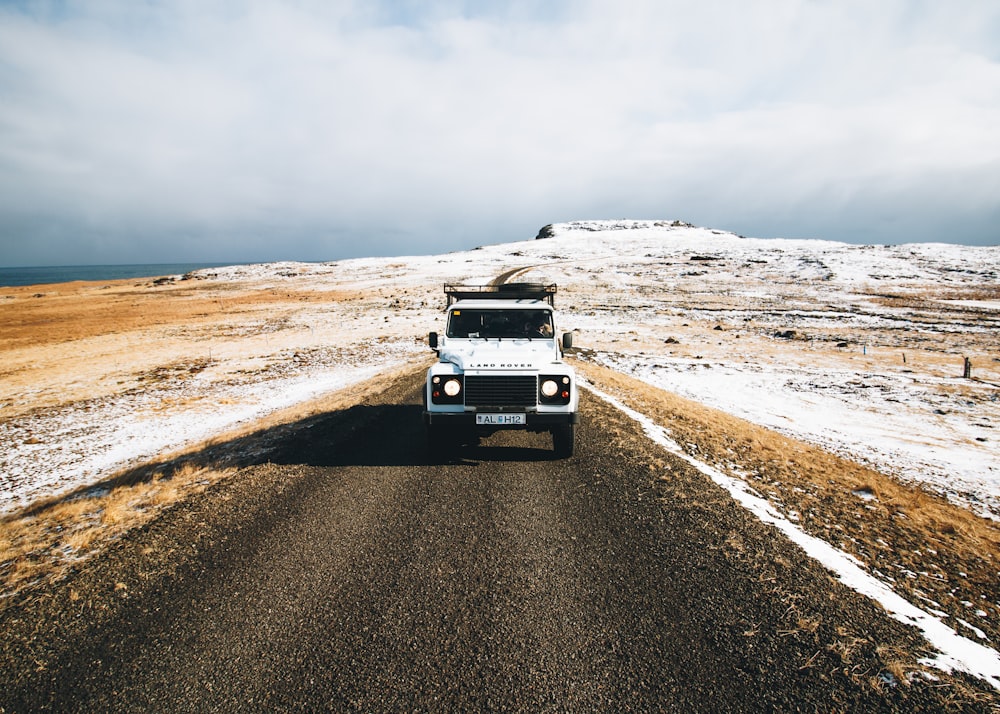 photography of vehicle in road