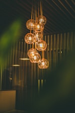 selective focus photography of lit pendant lights