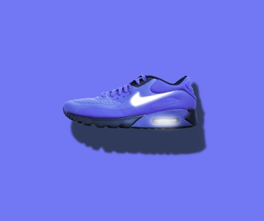 blue, white, and black Nike running shoes