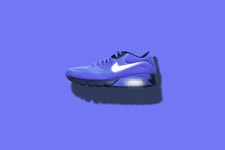 blue, white, and black Nike running shoes