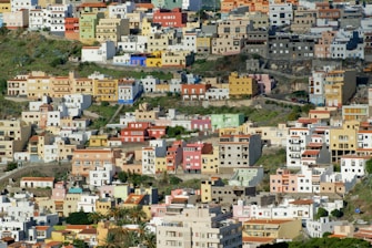 aerial photo of assorted-color concrete buildings at daytime