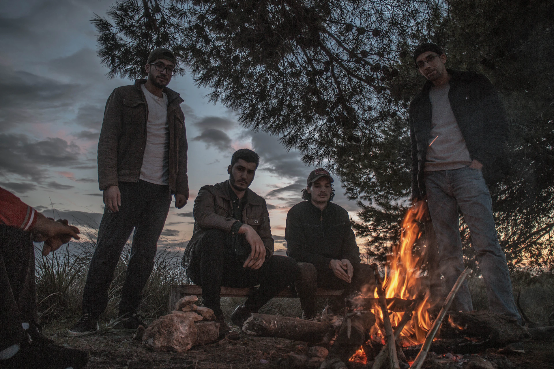 woman wearing yellow long-sleeved dress under white clouds and blue sky during daytime