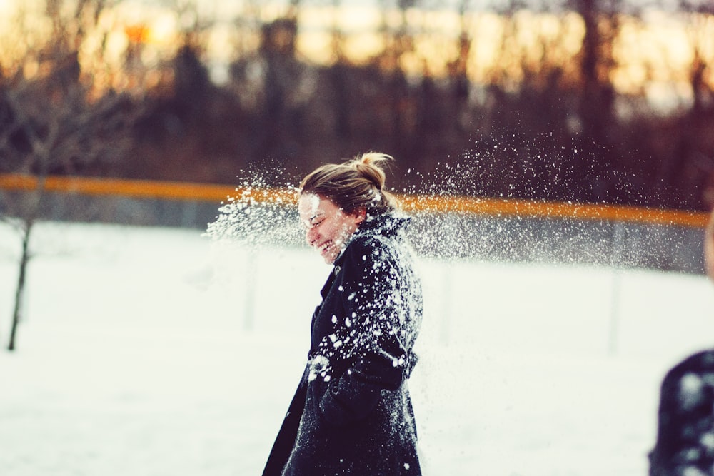 woman in black coat