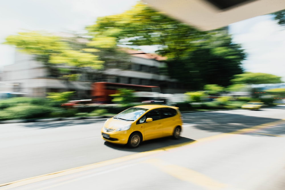 selective focus photography of yellow car