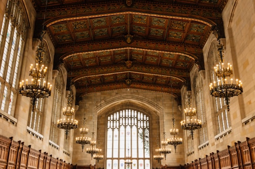 A grand hall featuring soaring ceilings and elegant decor.