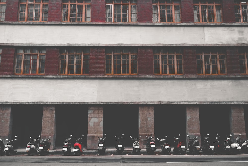 red, gray, and brown painted wall building taken at daytime