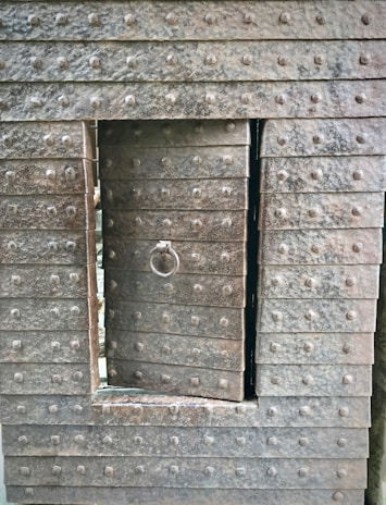 Close-up of a sturdy welded metal door frame showcasing fine craftsmanship and smooth finish.