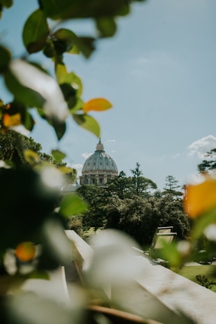 A serene dome glowing softly at dusk, nestled among lush greenery in Mekao.