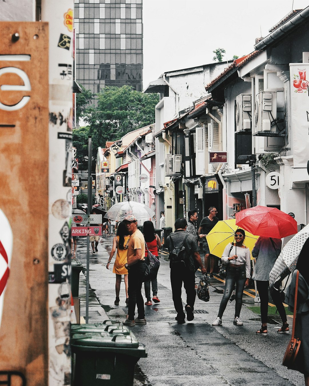 people using umbrella during daytime