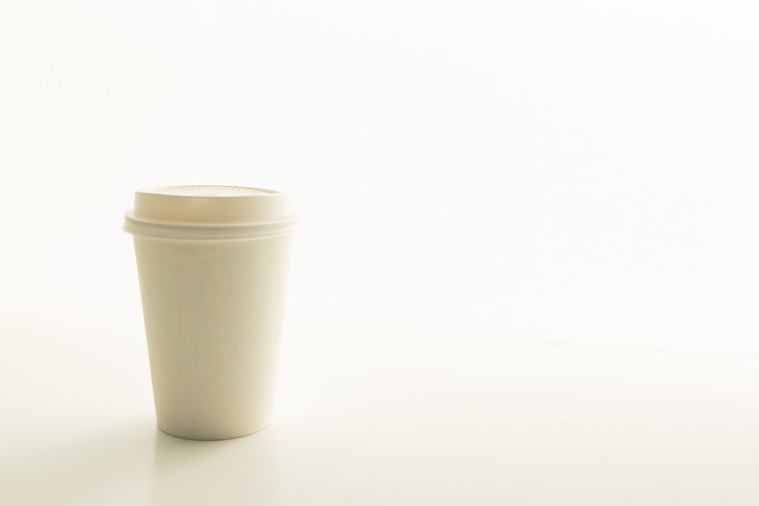 disposable cup on surface,