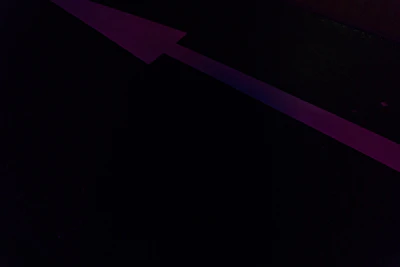 A glowing arrow pointing upwards on a stock chart indicating a buy signal.