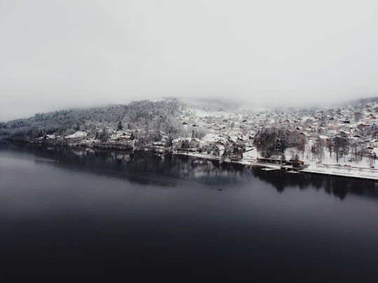 aerial view of snow covered city in Lac de Gérardmer France