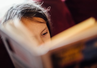 selective focus photography of girl