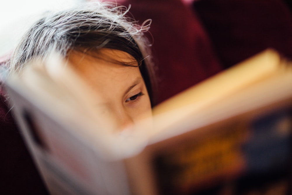 selective focus photography of girl