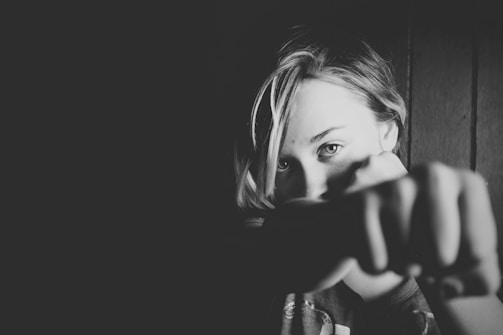 person shadow boxing grayscale