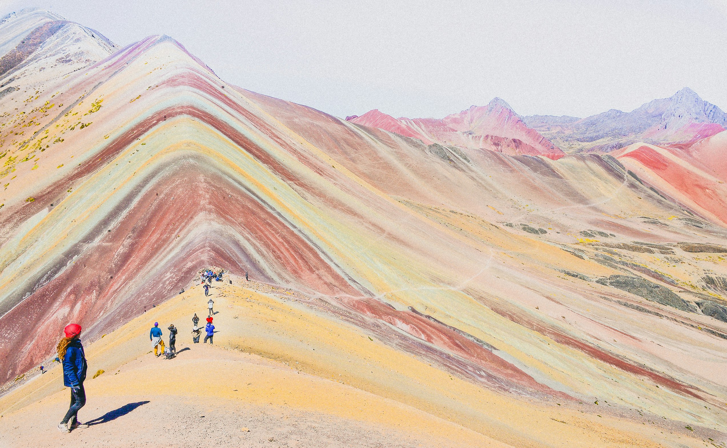 people walking on the mountains during daytime photography