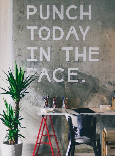 green plant beside white desk