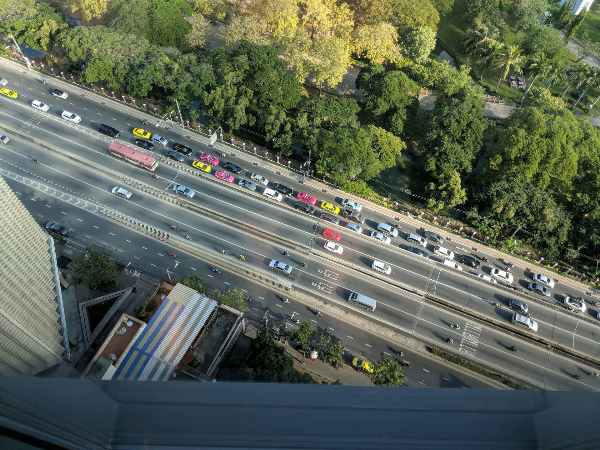 woman wearing yellow long-sleeved dress under white clouds and blue sky during daytime