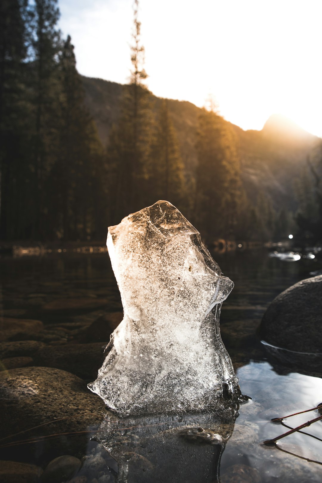 photography of melting ice at body of water