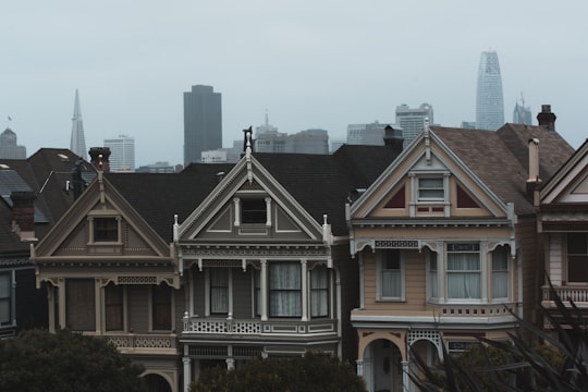 three gray and beige concrete houses under cloudy sky at daytime in Painted Ladies United States