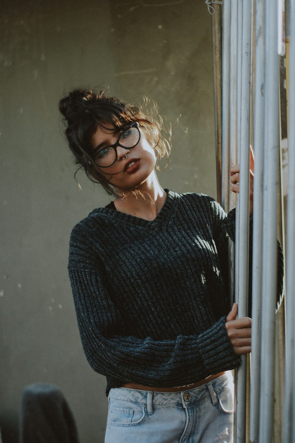 woman wearing black framed eyeglasses