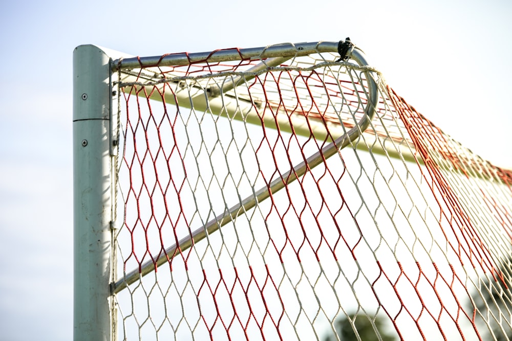 yellow and orange net with post