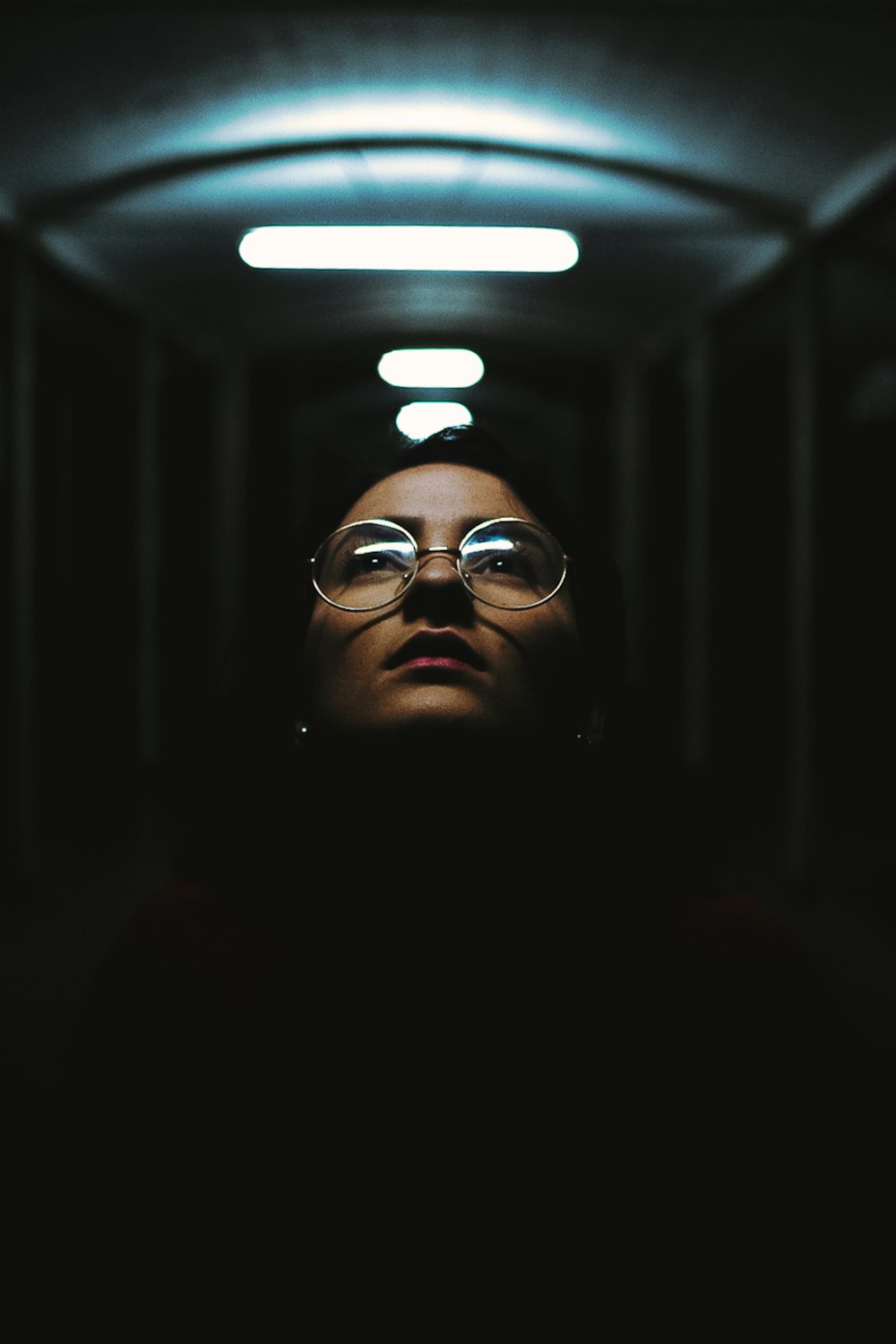 shallow focus photography of woman in clear eyeglases with silver frames