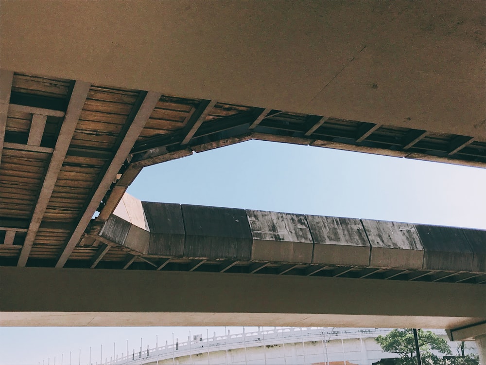 a view of the underside of a bridge from below