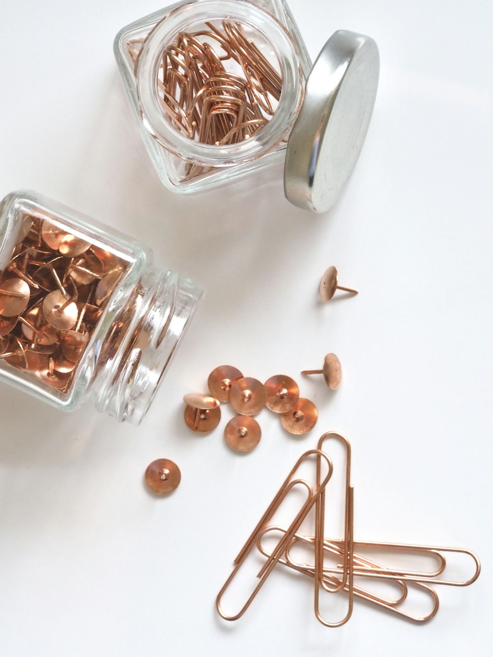brass thumbtacks and paper clips