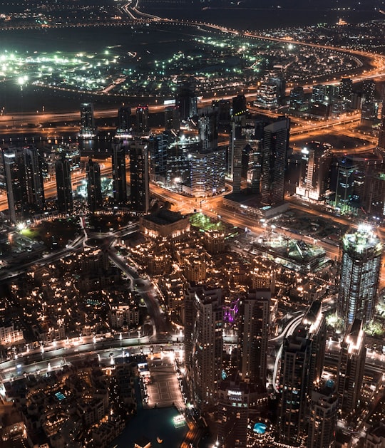 city landscape during night in At The Top Burj Khalifa United Arab Emirates