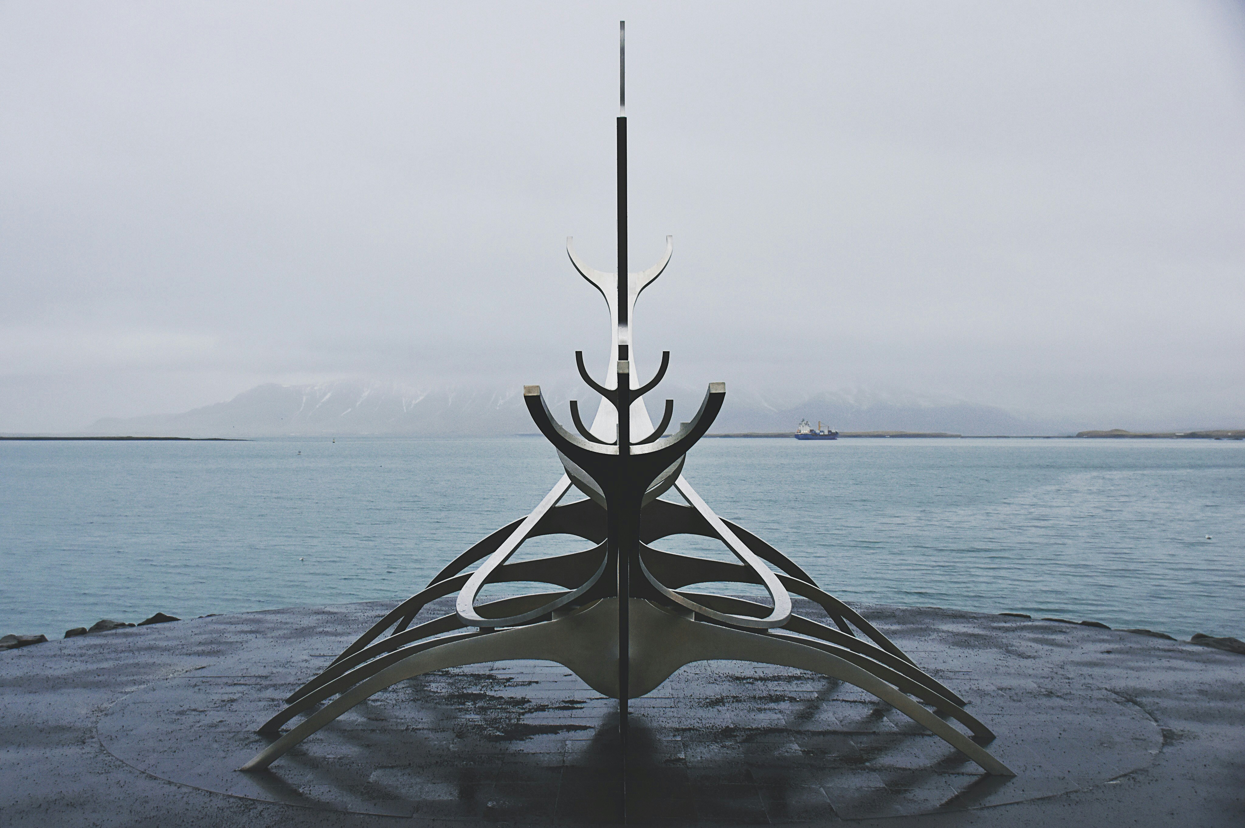 gray boat frame on dock near water