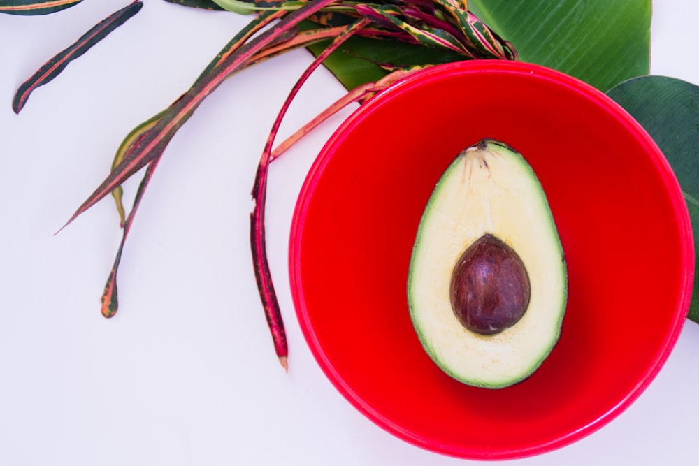 guacamole in red bowl