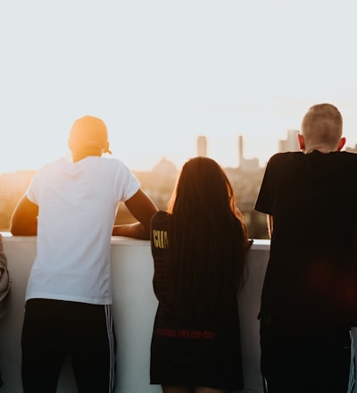 four person looking at the city