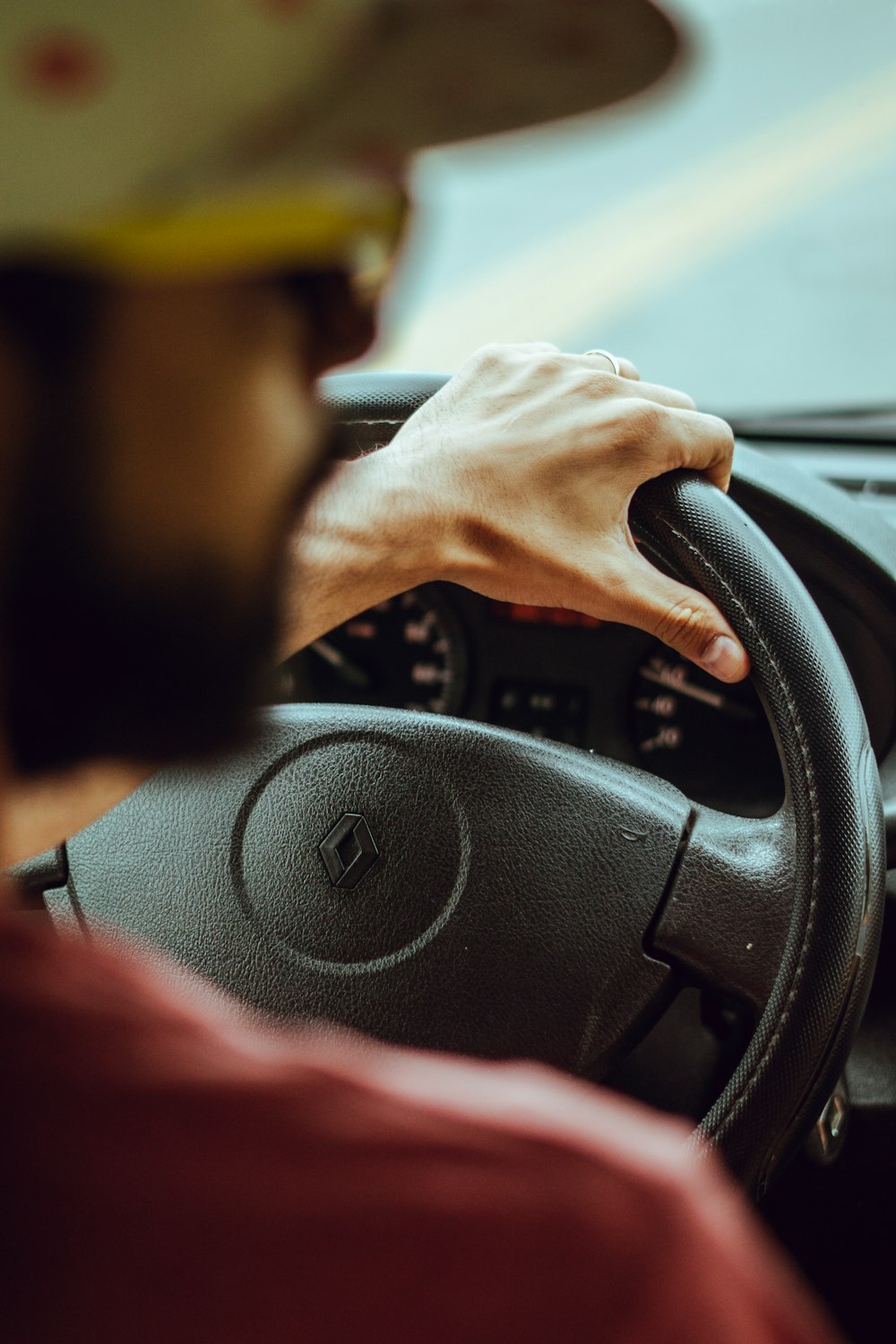 man driving Renault vehicle