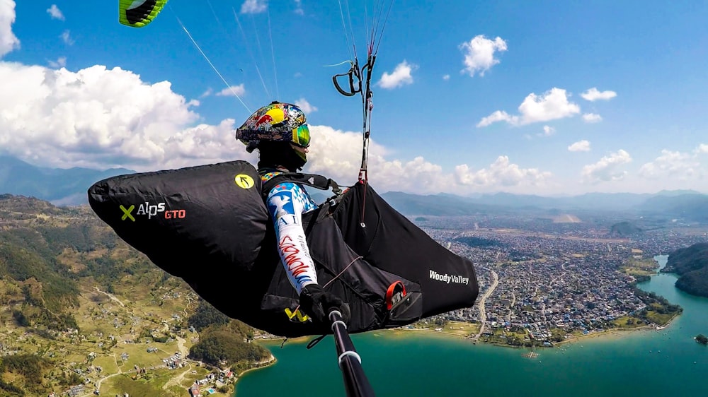 person riding on paragliding