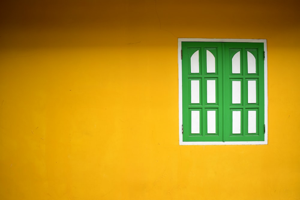 green wooden French window